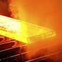 Hot steel on conveyor