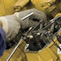 Natural Gas Pipeline equipment close up with engineer hands