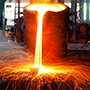 Workers in an active steel plant