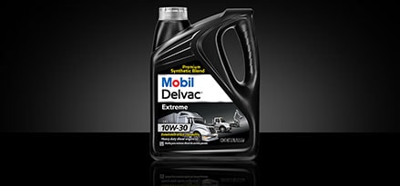 Mobil Delvac Extreme Limited Warranty with jug and truck