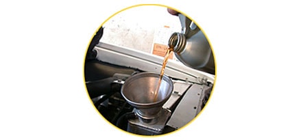 Coolant being poored into engine