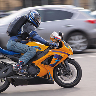 Motorcycle operates safely as drivers share the road