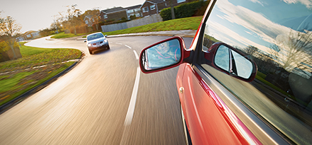 Side view of car in motion