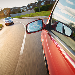 Side view of car in motion