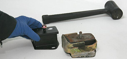 Both old engine mount and new engine mount