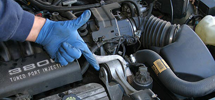 Lower engine and tighten bolts