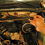 Mechanic moving the shifter through all gears to finish up changing 