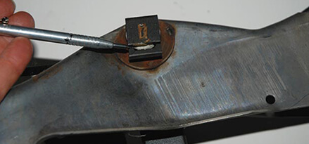Remove the clip prior to sliding the pedal pin out of the pedal mount
