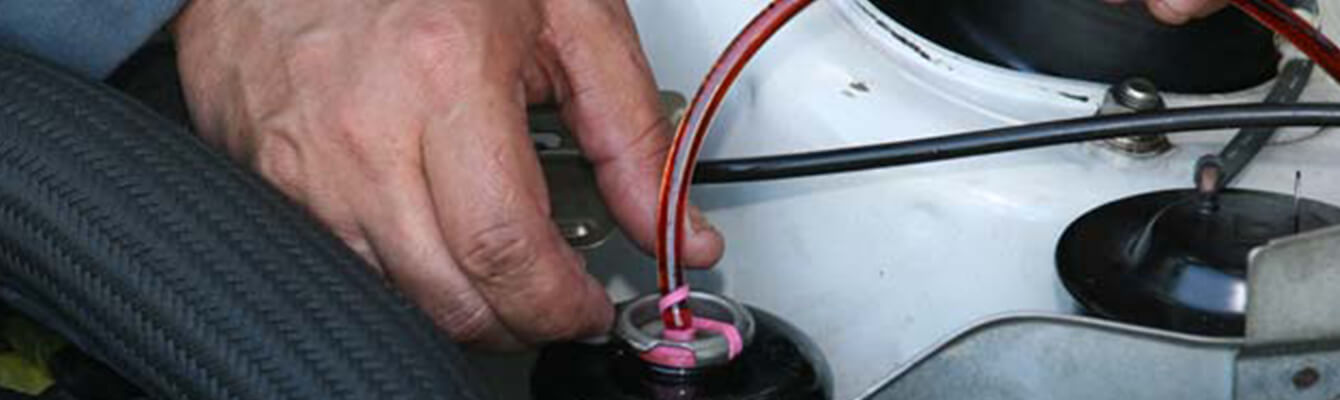 Bleed power system by running tubing into catch container Bleed power system by running tubing into catch container