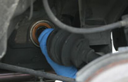 Pull axle from the transmission or differential