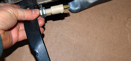 Checking the brake light switch mounted by the brake pedal