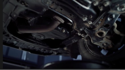 An image of the undercarraige of a vehicle to check for oil leaks.