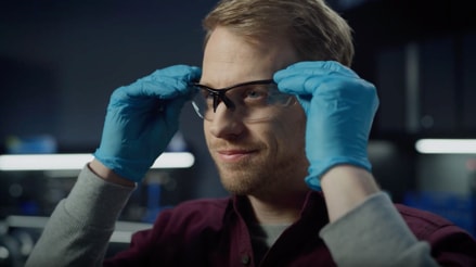 A man wearing safety glasses.