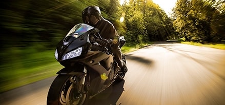 Blue motorcycle on road