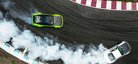 car drifting with smoke