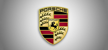 Porsche shield logo on a silver background