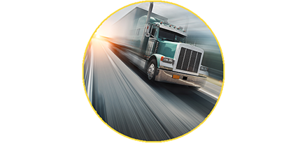Green truck driving on highway