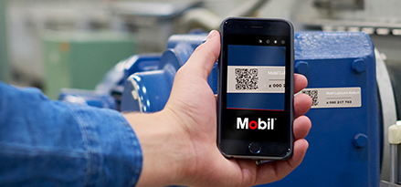 Mobil customer using the Mobil Lubricant Analysis app to scan a sample QR code