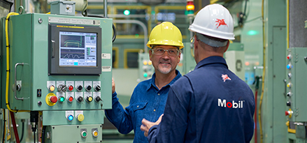 Mobil services engineers talking