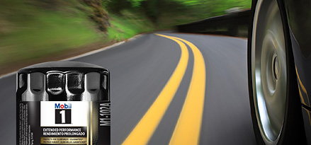outside perspective of sports car driving along curved road.