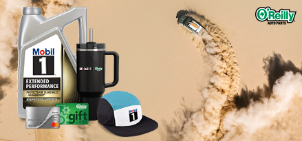 A car, seen from above, doing donuts in the desert with a cloud of sand kicked up behind it. Mobil 1™ motor oil and prizes are superimposed over the image.