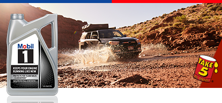 SUV driving on dirt road