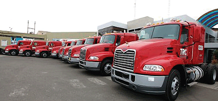 Red truck fleet parked