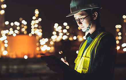 Man using tablet on worksite