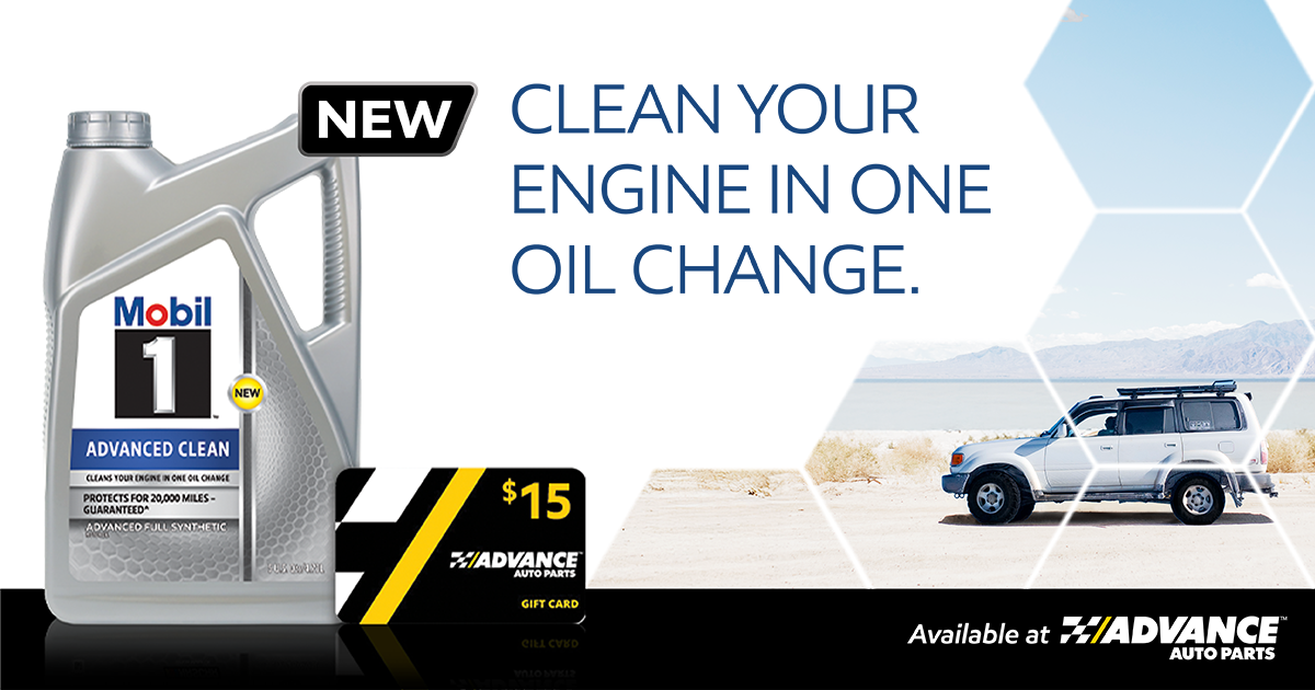 A bottle of Mobil 1 Advanced Clean motor oil and a $15 Advance Auto Parts gift card appear on the left. On the right is a white SUV driving on sand with a lake and a mountain in the background