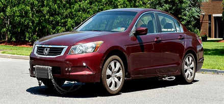 Maroon Honda Accord test vehicle with a modified front bumper