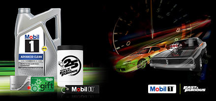 A bottle of Mobil 1 motor oil, two gift cards, a metal koozie, and an embroidered keychain are seen locked up over a green blur graphic