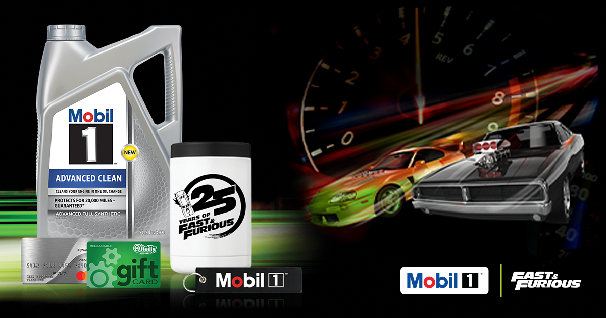 A bottle of Mobil 1 motor oil, two gift cards, a metal koozie, and an embroidered keychain are seen locked up over a green blur graphic
