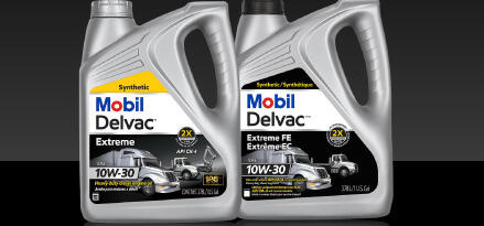 Mobil Delvac Extreme FE 10W-30 synthetic heavy-duty diesel engine oil containers.