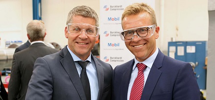 Gerald De Causemaeker, EAME marketing manager at ExxonMobil commemorates the deal with Martin Wendel, President of Services Division at Burckhardt Compression