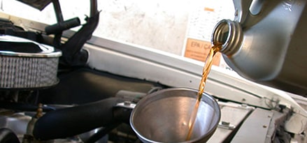 Pour in engine coolant and check coolant level