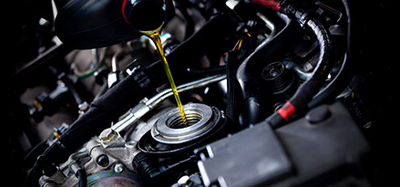 Pouring oil in to engine