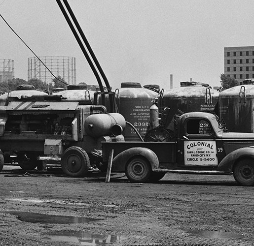 black and white image with an old truck